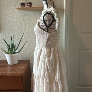 Dainty and flowing stretchy upper Cream Cocktail Dress Flutter Sleeveless